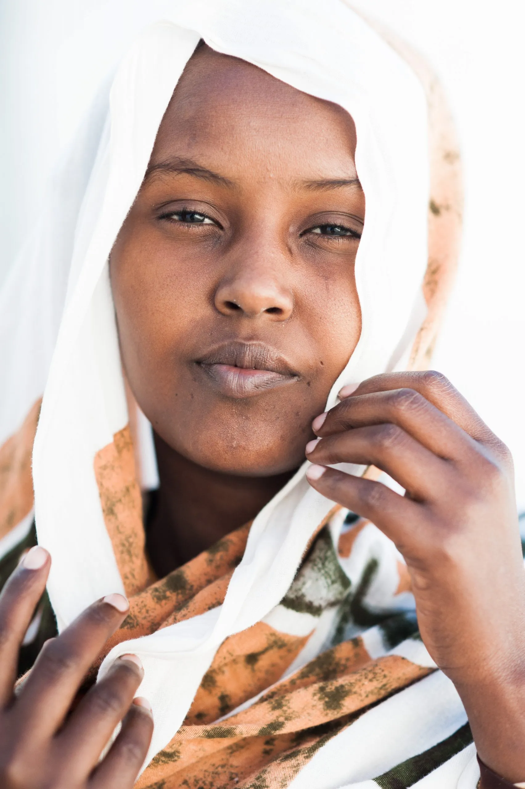 Portrait of a woman locked up in Ta'Kandja detention center in Malta.
